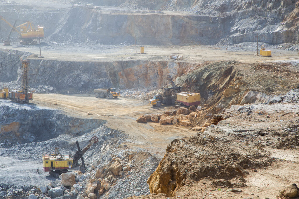 Machines extracting gold from gold mine